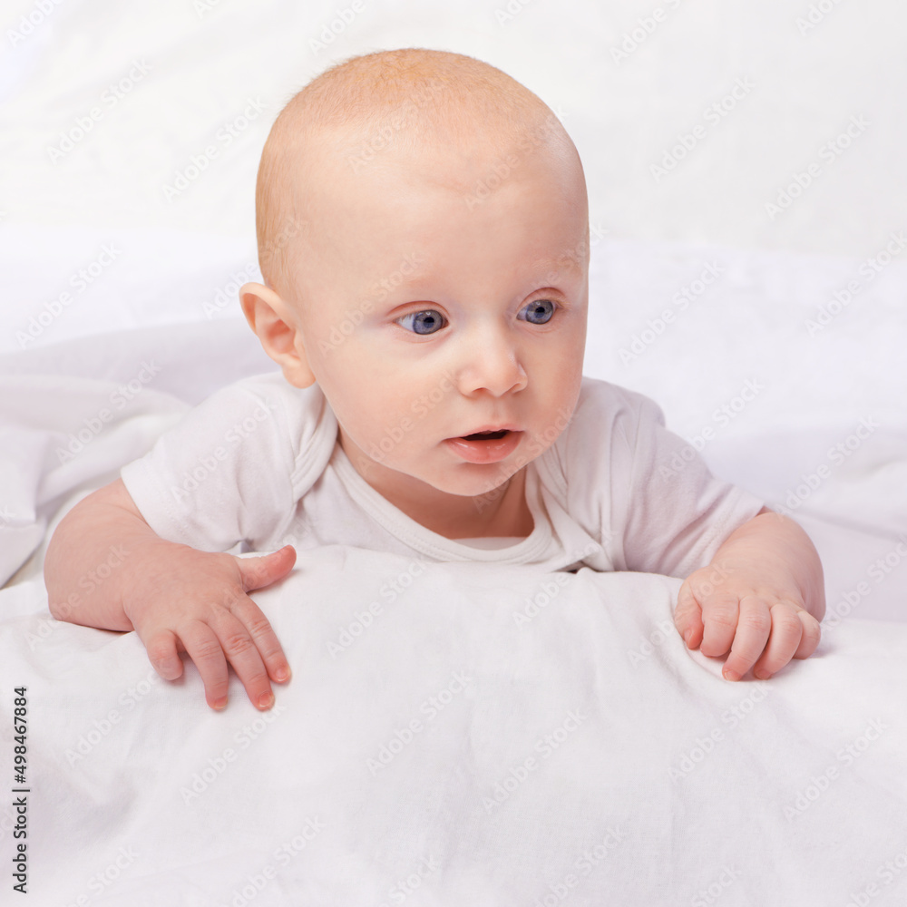 The world holds many wonders ahead for him. Cropped shot of an adorable baby boy in a studio. The world holds many wonders ahead for him. Cropped shot of an adorable baby boy in a studio.