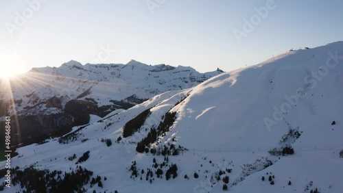 aerial shot during sunset in Jungfrau Ski Region in beautiful Switzerland, Grindelwald photo