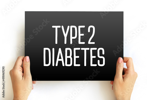 Type 2 diabetes - long-term medical condition in which your body doesn't use insulin properly, resulting in unusual blood sugar levels, text concept on card photo