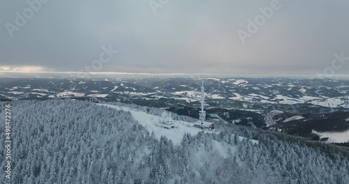 winter drone orbit move around the Radhost chappel during golden hour part3, Beskydy 4k photo