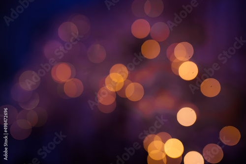 Abstract Golden glare on abstract bokeh background.