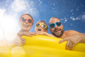 Happy family having fun on summer vacation