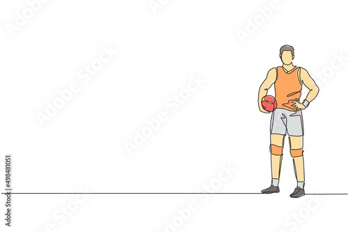 One continuous line drawing of young male professional volleyball player pose standing on court. Healthy competitive team sport concept. Dynamic single line draw design vector graphic illustration