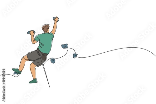 One continuous line drawing of young bravery climber man practice overhanging rock cliff mountain with safety rope. Dangerous extreme sport concept. Dynamic single line draw design vector illustration