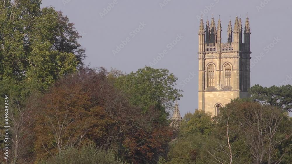 Magdalen college tower through the trees, Oxford. Magdalen college tower through the trees, Oxford.