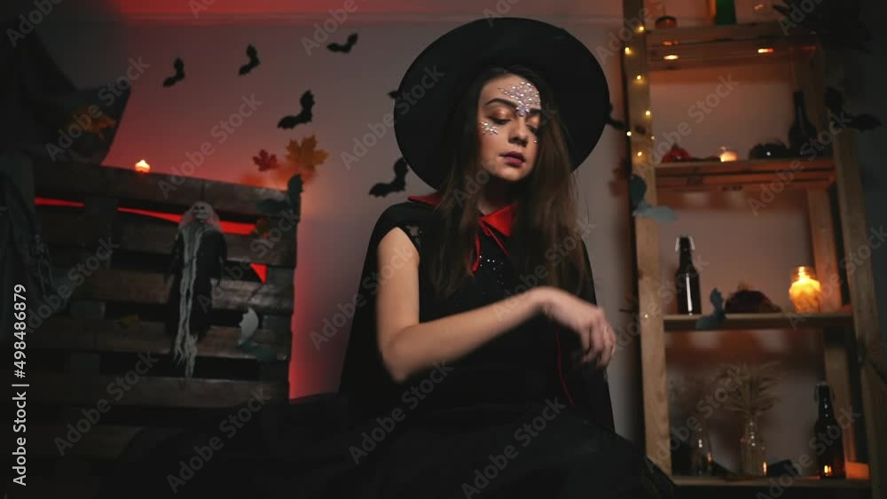 Beautiful girl in a carnival witch costume Beautiful girl in a carnival witch costume