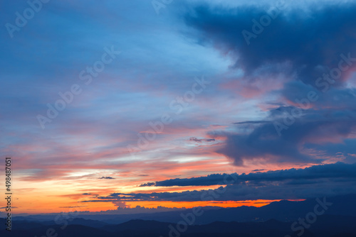Colorful Cloudy sky At Sunset Dawn Sunrise. Sun Over Skyline, © AungMyo