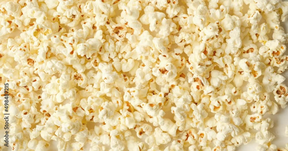 Background with popcorn. Looped 4K stop motion animation Background with popcorn. Looped 4K stop motion animation