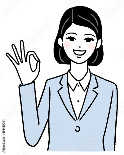 OKサインを出す若い女性
