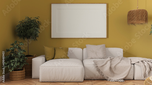 Fototapeta Naklejka Na Ścianę i Meble -  Wooden scandinavian living room close up in yellow tones, frame mockup with copy space, white fabric sofa with pillows, blanket and plants. Modern minimalist interior design concept