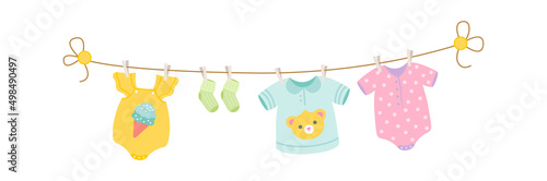 Baby clothes drying on a rope. Vector illustration