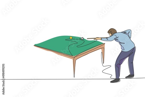 One continuous line drawing of young handsome man focus aiming before hit the pool billiard balls with stick. Tournament indoor sport game concept. Dynamic single line draw design vector illustration