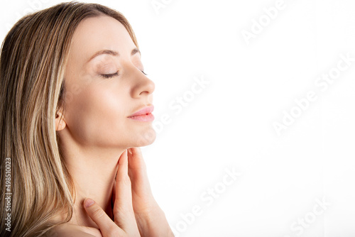 Beautiful woman shoulder cropped portrait with copy space.