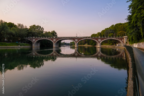 Beautiful sunset view of the arch bridge over the river Po in the city of Turin  Italy