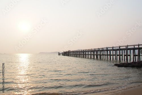 A wooden walkway that stretches into the sea. vacation travel concept
