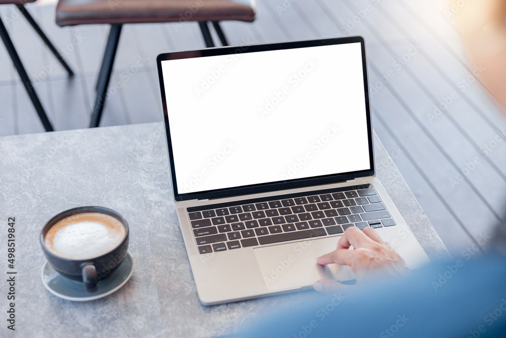 computer screen blank mockup.hand woman work using laptop with white background for advertising,contact business search information on desk at coffee shop.marketing and creative design computer screen blank mockup.hand woman work using laptop with white background for advertising,contact business search information on desk at coffee shop.marketing and creative design
