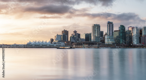 Panoramic View of Modern City Building Skyline on West Coast Pacific Ocean. Dramatic Sunrise Sky Art Render. Stanley Park, Coal Harbour, Downtown Vancouver, British Columbia, Canada. © edb3_16