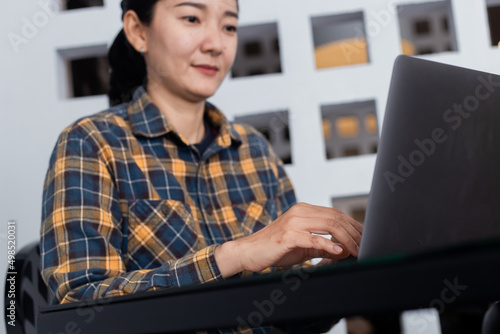 woman work using computer hand typing laptop keyboard contact us.student study learning education online.adult professional people chatting search at office.concept for technology device business