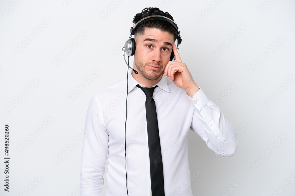 Telemarketer caucasian man isolated on white background thinking an idea Telemarketer caucasian man isolated on white background thinking an idea