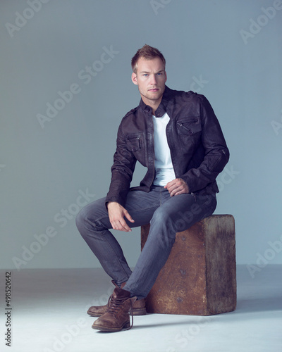 Hes got style with rugged good looks. Studio portrait of a fashionably dressed young man.