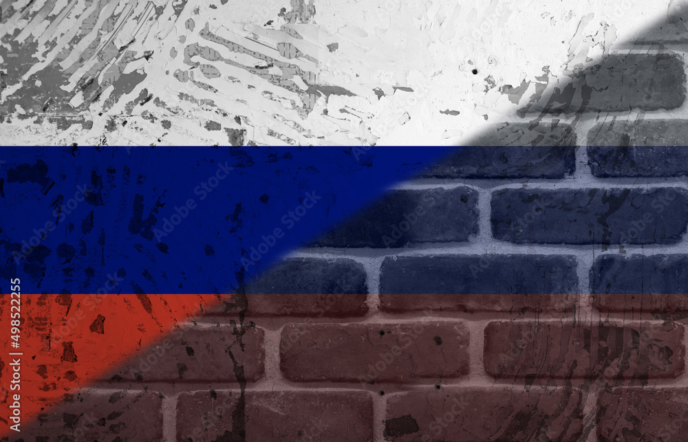 Composite image of flag of russia painted on brick wall with copy space