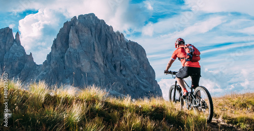 Mountain biking in the Dolomites Italy. Mountain bike, electric bike in the mountains on the trail and bike paths