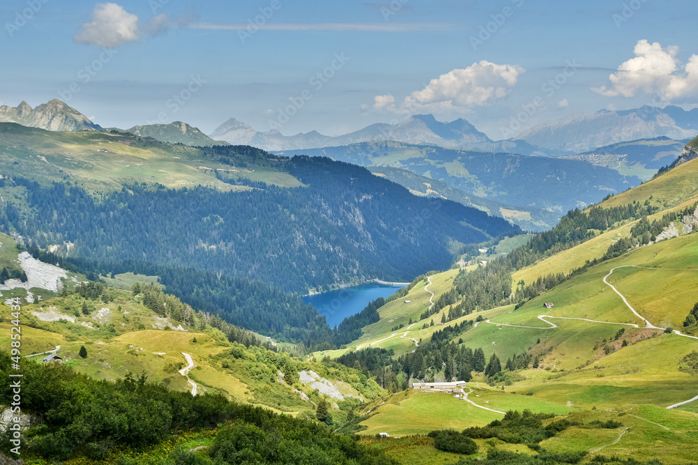 Beautiful alpine summer landscape with Saint-Guerin lake in Savoie, France. Mountains travel background