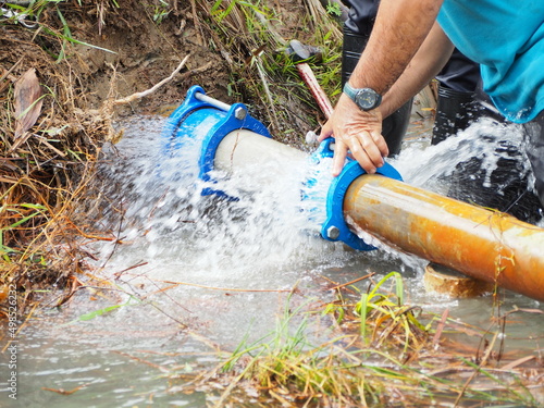 Repair work on broken pipes is being carried out by contractors