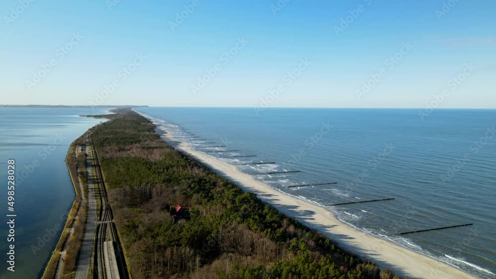 Aerial of bay with beach and highway. Ambivalence landscape. Kuznica. Poland. Aerial of bay with beach and highway. Ambivalence landscape. Kuznica. Poland.