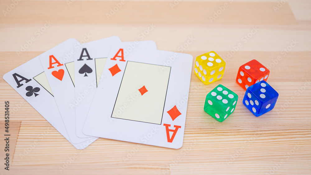 Playing cards and colorful dice_21