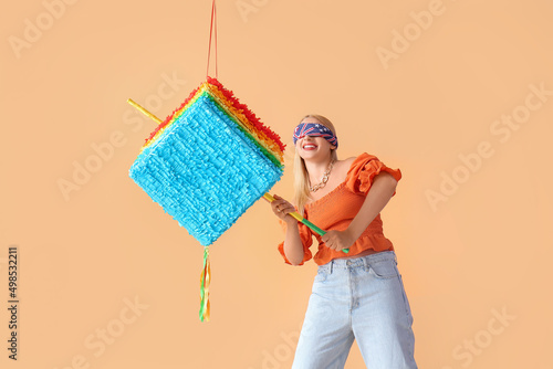 Young woman with blindfold ...