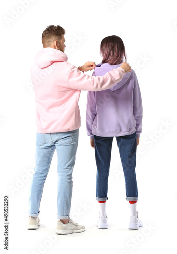 Cool young couple in hoodie...