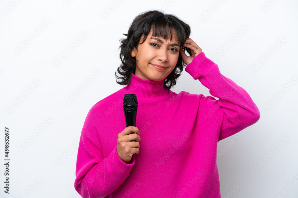 Young Argentinian singer woman isolated on white background having doubts Young Argentinian singer woman isolated on white background having doubts