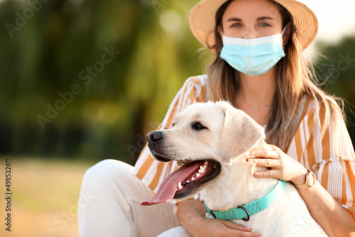 Woman in medical mask and c...