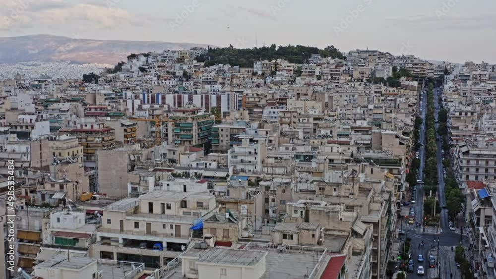 Pireas Greece Aerial v16 low level drone flying along leof. vasileos georgiou steep street leading to kastella hilltop, flyover reveals beautiful harbor view of saronic gulf - September 2021 Pireas Greece Aerial v16 low level drone flying along leof. vasileos georgiou steep street leading to kastella hilltop, flyover reveals beautiful harbor view of saronic gulf - September 2021