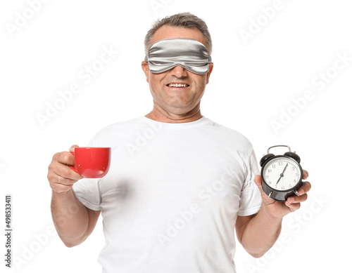 Mature man with sleep mask,...