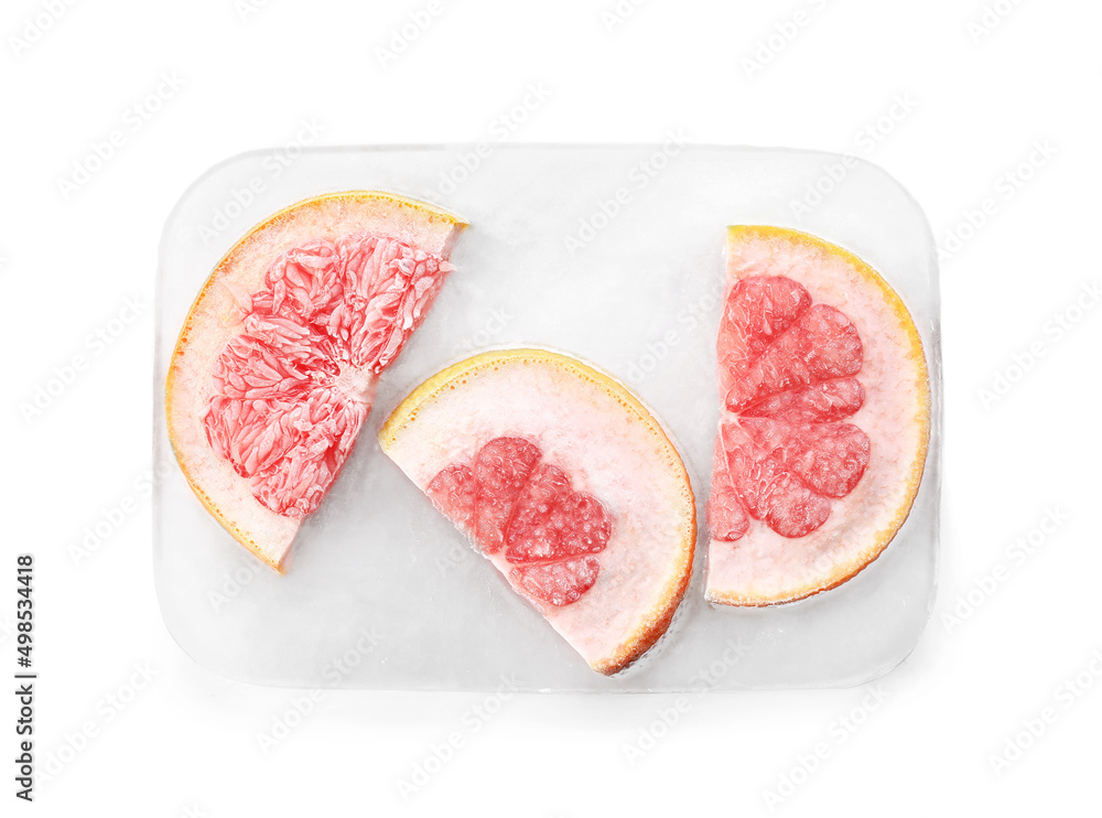 Fresh grapefruit frozen in ice on white background Fresh grapefruit frozen in ice on white background