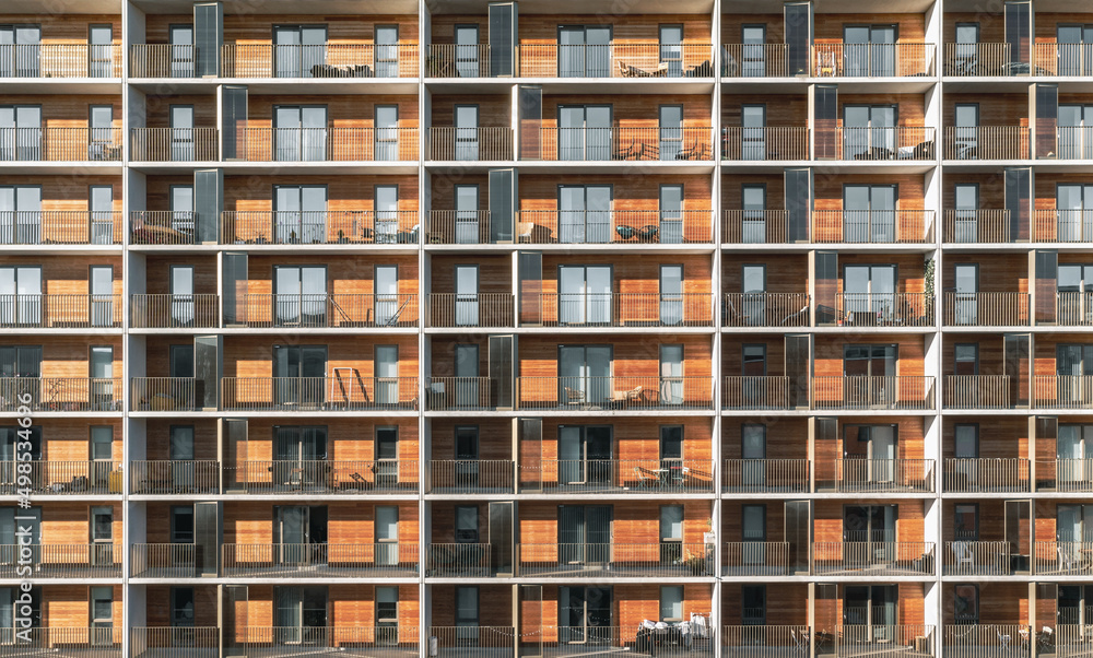 full frame facade of apartment buildings with balconies