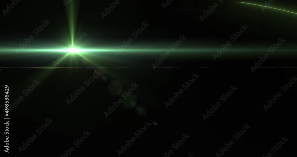 Image of green glowing light on black background Image of green glowing light on black background