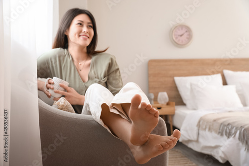 Bare feet of young Asian wo...