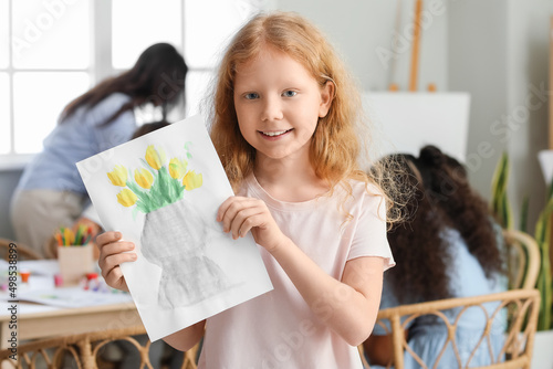 Cute redhead girl with pict...