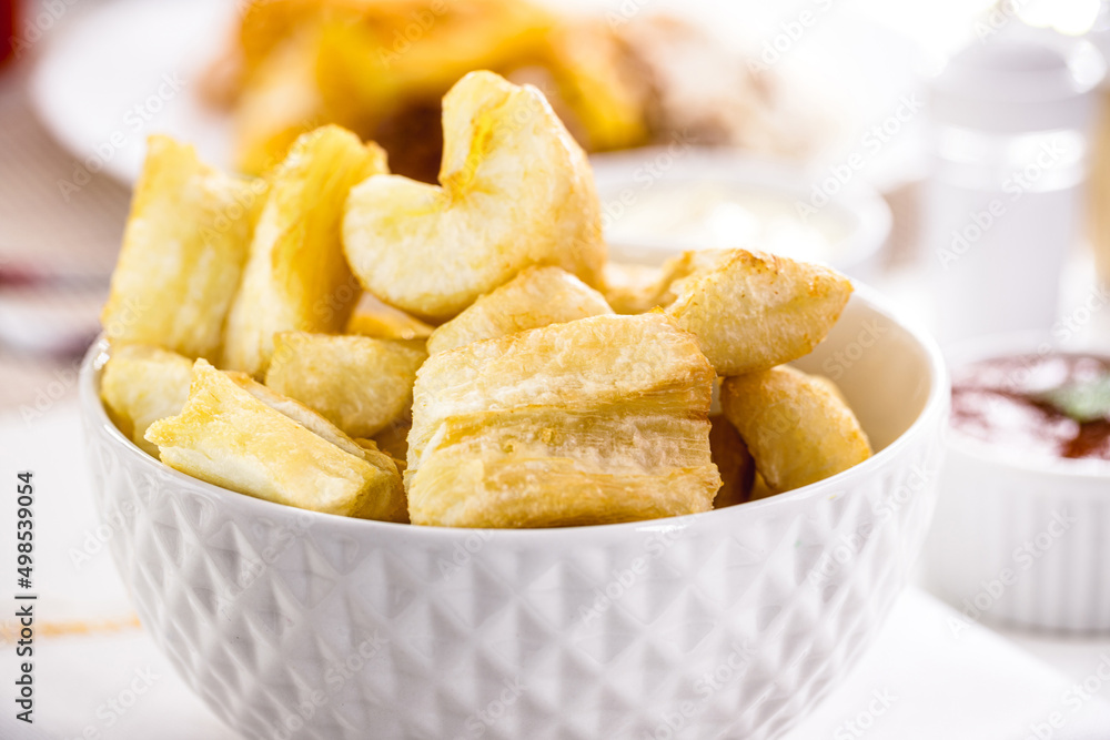 sweet and fried cassava bowl, typical south america and brazil snack, homemade food sweet and fried cassava bowl, typical south america and brazil snack, homemade food