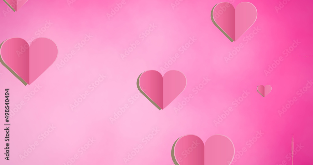 Image of hearts falling on pink background