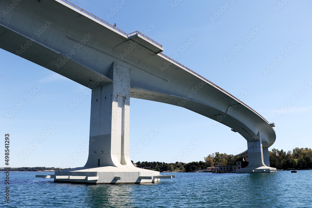 Punta Penna Pizzone bridge (also known as Aldo Moro bridge), is a girder bridge that spans Mar Piccolo in Taranto, Puglia, Italy Punta Penna Pizzone bridge (also known as Aldo Moro bridge), is a girder bridge that spans Mar Piccolo in Taranto, Puglia, Italy