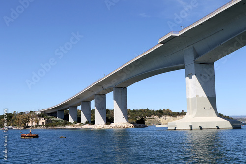 Punta Penna Pizzone bridge (also known as Aldo Moro bridge), is a girder bridge that spans Mar Piccolo in Taranto, Puglia, Italy © Massimo Todaro