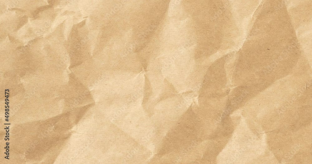 Wrinkled sheet of brown paper. Textured backdrop Wrinkled sheet of brown paper. Textured backdrop