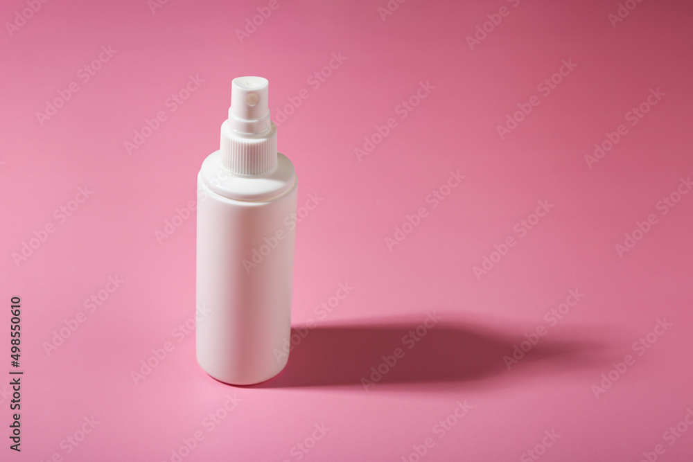 Cosmetic container with cosmetic product on a pink background. Cosmetic container with cosmetic product on a pink background.
