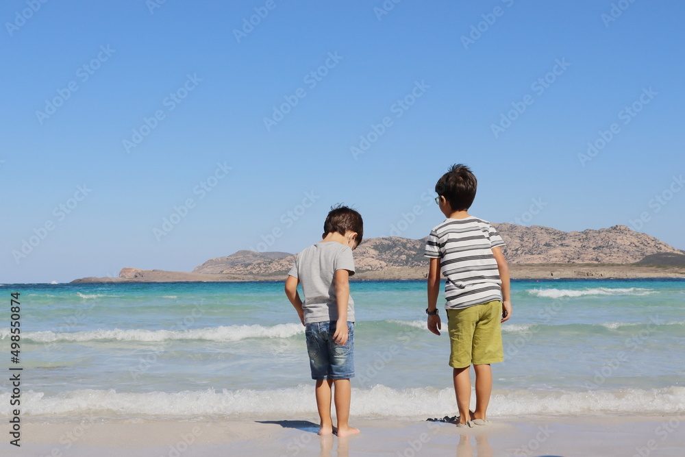 couple walking on beach couple walking on beach