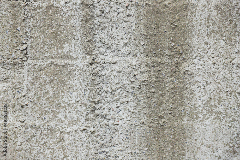 Old gray concrete wall close-up - texture. Industrial background