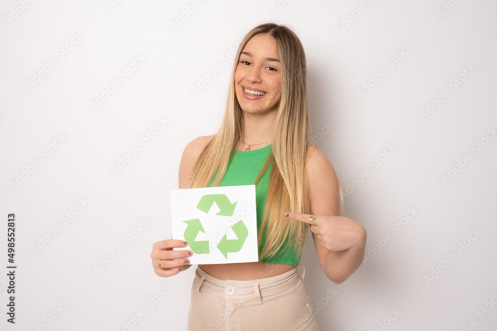 Young woman with ecological symbol- isolated over a white background